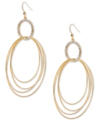 A funky take on classic elegance. These oval hoop earrings from Haskell showcase several hoops dangling from a pave crystal accented ring. Crafted in gold tone mixed metal. Approximate drop: 4-1/10 inches. A funky take on classic elegance. These oval hoop earrings from Haskell showcase several hoops dangling from a pave crystal accented ring. Crafted in gold tone mixed metal. Approximate drop: 4-1/10 inches.