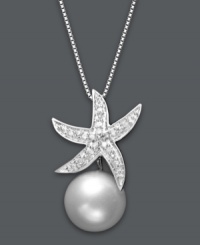 Bring a piece of the seashore with you year round! This exquisite pendant features a diamond-accented starfish that's complemented by a shimmering cultured freshwater pearl (10 mm). Setting and chain crafted in sterling silver. Approximate length: 18 inches. Approximate drop: 1 inch. Bring a piece of the seashore with you year round! This exquisite pendant features a diamond-accented starfish that's complemented by a shimmering cultured freshwater pearl (10 mm). Setting and chain crafted in sterling silver. Approximate length: 18 inches. Approximate drop: 1 inch.