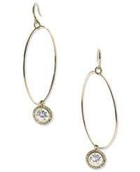 Let your look shine! These hoop earrings from Michael Kors flaunt a circular pendant with a clear cubic zirconia stone. Crafted in gold tone mixed metal. Approximate drop: 2-1/2 inches. Let your look shine! These hoop earrings from Michael Kors flaunt a circular pendant with a clear cubic zirconia stone. Crafted in gold tone mixed metal. Approximate drop: 2-1/2 inches.