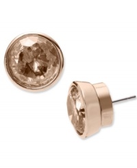 Every true fashionista knows...it's all about the sparkle. Michael Kors subtly-stunning stud earrings feature round-cut cubic zirconias (11 ct. t.w.) in bezel-post setting. Crafted in rose gold tone mixed metal. Approximate diameter: 1/2 inch.