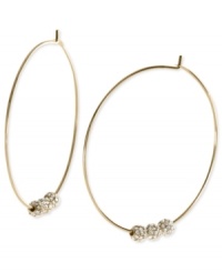 Michael Kors adds an elegant touch to its pair of hoop earrings. Crafted from gold ion-plated mixed metal, the earrings feature glass pave fireballs for a lustrous touch. Approximate diameter: 2 inches. Michael Kors adds an elegant touch to its pair of hoop earrings. Crafted from gold ion-plated mixed metal, the earrings feature glass pave fireballs for a lustrous touch. Approximate diameter: 2 inches.