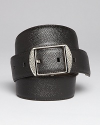 The pebbled leather of this Burberry belt has a slight sheen that finishes your attire with professional polish. The pebbled leather of this Burberry belt has a slight sheen that finishes your attire with professional polish.