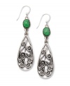 For a look that's perfectly hippie-chic. Lucky Brand's openwork teardrop earrings feature a fancy filigree pattern accented by semi-precious turquoise stones. Crafted in silver tone mixed metal. Approximate drop: 2-4/10 inches.