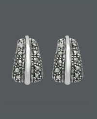Tiny hoops that pack a sparkling punch. These mini J-shaped hoops by Genevieve & Grace feature glittering marcasite accents set in sterling silver. Approximate drop: 9/16 inch. Tiny hoops that pack a sparkling punch. These mini J-shaped hoops by Genevieve & Grace feature glittering marcasite accents set in sterling silver. Approximate drop: 9/16 inch.