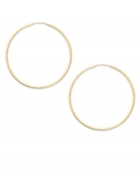 Forever stylish, forever chic. This pair of endless hoop earrings comes in 14k gold. Approximate diameter: 15 mm. Forever stylish, forever chic. This pair of endless hoop earrings comes in 14k gold. Approximate diameter: 15 mm.