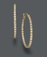 Add a little pop and sparkle to your style. These traditional hoop earrings by B. Brilliant incorporate glittering round-cut cubic zirconias (1-1/2 ct. t.w.) set in 18k gold over sterling silver. Approximate diameter: 1-1/2 inches.