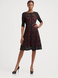 Sheer lace layers a vibrant slip in this retro, fit-and-flare silhouette.Jewel necklineRuched three-quarter sleevesButton-down frontSet-in waistSkinny beltPrincess seamsAbout 25 from natural waist81% cotton/10% nylon/9% polyesterDry cleanMade in USA of Italian fabric Sheer lace layers a vibrant slip in this retro, fit-and-flare silhouette.Jewel necklineRuched three-quarter sleevesButton-down frontSet-in waistSkinny beltPrincess seamsAbout 25 from natural waist81% cotton/10% nylon/9% polyesterDry cleanMade in USA of Italian fabric