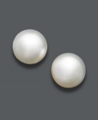 Look the picture of elegance in polished studs. Earrings highlight a single cultured South Sea pearl (11-12 mm) in a 14k white gold post setting. Approximate diameter: 1/2 inch. Look the picture of elegance in polished studs. Earrings highlight a single cultured South Sea pearl (11-12 mm) in a 14k white gold post setting. Approximate diameter: 1/2 inch.