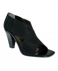 Keep an open mind with the Casandra sandals by Tahari. Stretch straps criss-cross your warm weather-ready feet, with revealing cutaways here and there. Keep an open mind with the Casandra sandals by Tahari. Stretch straps criss-cross your warm weather-ready feet, with revealing cutaways here and there.
