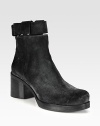 An urban-ready suede ankle boot with a towering stacked heel, exposed metal zipper and detachable ankle strap. Stacked heel, 2 (50mm)Stacked platform, ¾ (20mm)Compares to a 1¼ heel (30mm)Suede upperBack zip and detachable wrap-around strap with metal pull-tab closureLeather lining and solePadded insoleMade in Italy