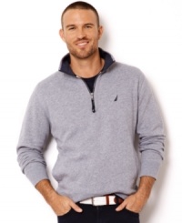 Anything but basic, this quarter-zip sweatshirt from Nautica will be a fall staple. Anything but basic, this quarter-zip sweatshirt from Nautica will be a fall staple.