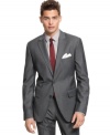 Rule the boardroom in dapper style with this sleek American Rag blazer.