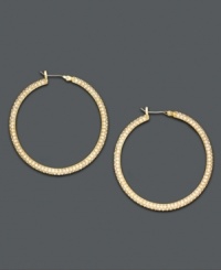 Lauren by Ralph Lauren adds sparkle to classic hoop earrings by turning them inside out and adding a layer of pave crystal. Crafted in goldtone mixed metal. Approximate diameter: 1-1/2 inches. Lauren by Ralph Lauren adds sparkle to classic hoop earrings by turning them inside out and adding a layer of pave crystal. Crafted in goldtone mixed metal. Approximate diameter: 1-1/2 inches.