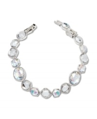 No matter what the occasion, add sparkle to your look with Swarovski's glimmering rhinestone bracelet. Made in silver tone mixed metal, it features an array of asymmetrical crystals. Approximate length: 7 inches.