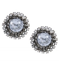 Add special flair to any look in chic sunbursts of sparkle. Betsey Johnson stud earrings highlight pretty round-cut crystals encircled by small crystal halos. Crafted in hematite tone mixed metal. Approximate diameter: 3/4 inch. Add special flair to any look in chic sunbursts of sparkle. Betsey Johnson stud earrings highlight pretty round-cut crystals encircled by small crystal halos. Crafted in hematite tone mixed metal. Approximate diameter: 3/4 inch.