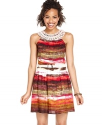 A pretty picture: crochet knit detail acts as a chic accent to the rich, abstract print on this day dress from BCX! A pretty picture: crochet knit detail acts as a chic accent to the rich, abstract print on this day dress from BCX!