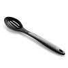 This Calphalon nylon spoon features long handles and an extra generous scoop size that make maneuvering in the kitchen faster and safer. The slotted spoons offer a quick draining slot pattern and a grip-anywhere handle that lets you decide where to hold it.
