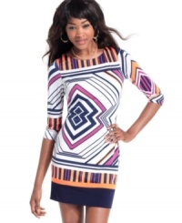 This sheath dress from Baby Phat commands all attention with its colorful geometric print and alluring back cutout. (Clearance) This sheath dress from Baby Phat commands all attention with its colorful geometric print and alluring back cutout. (Clearance)