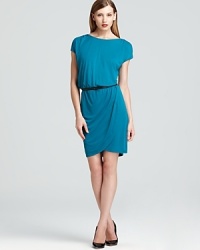 Show off your feminine side in an effortless DKNYC dress, flaunting dainty flutter sleeves and a breezy tulip skirt. A sleek faux-leather belt cinches the silhouette, taking the style from darling to dramatic. Show off your feminine side in an effortless DKNYC dress, flaunting dainty flutter sleeves and a breezy tulip skirt. A sleek faux-leather belt cinches the silhouette, taking the style from darling to dramatic.