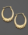 Wrap up your style with these lovely hoop earrings crafted in 14k gold. Approximate diameter: 1/2 inch. Approximate length: 3/4 inch.