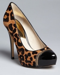 Win the style race in these cheetah-print MICHAEL Michael Kors platform pumps. Stylish cap toes are finished off with signature zipper accents. Win the style race in these cheetah-print MICHAEL Michael Kors platform pumps. Stylish cap toes are finished off with signature zipper accents.