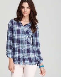 Channel tomboy-chic in this C&C California plaid shirt--the perfect style statement with your favorite denim. Channel tomboy-chic in this C&C California plaid shirt--the perfect style statement with your favorite denim.