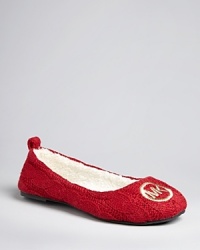 These ballet-style, cable-knit slippers are a fun, fashionable take on cold-weather dressing, accented by an embroidered logo and a fluffy faux-fur lining. These ballet-style, cable-knit slippers are a fun, fashionable take on cold-weather dressing, accented by an embroidered logo and a fluffy faux-fur lining.