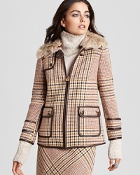 Exotics go elegant as a plush fur collar accents a plaid Tory Burch coat. Team with the coordinating Tory Burch pencil skirt for a refined walk on the wild side. Exotics go elegant as a plush fur collar accents a plaid Tory Burch coat. Team with the coordinating Tory Burch pencil skirt for a refined walk on the wild side.