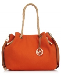 Easygoing and up for anything, this casual-cool design from MICHAEL Michael Kors is the ultimate daytime delight. Crafted from durable canvas with sturdy straps and golden detailing, it'll carry you from work to weekend in a wink. Easygoing and up for anything, this casual-cool design from MICHAEL Michael Kors is the ultimate daytime delight. Crafted from durable canvas with sturdy straps and golden detailing, it'll carry you from work to weekend in a wink.