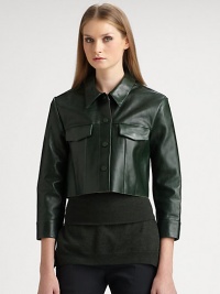Glimmering leather jacket in an abbreviated silhouette, defined by three-quarter sleeves and front flap pockets. Point collarFront snap closuresFront flap pocketsThree-quarter sleevesButtoned cuffsAbout 16 from shoulder to hemLeatherDry clean with leather specialistImportedModel shown is 5'10 (177cm) wearing US size 4. Glimmering leather jacket in an abbreviated silhouette, defined by three-quarter sleeves and front flap pockets. Point collarFront snap closuresFront flap pocketsThree-quarter sleevesButtoned cuffsAbout 16 from shoulder to hemLeatherDry clean with leather specialistImportedModel shown is 5'10 (177cm) wearing US size 4.