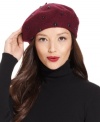 A classically chic beret gets a mod makeover with this studded wool design from Nine West. Pair it with any outfit for a decidedly rive gauche appeal.