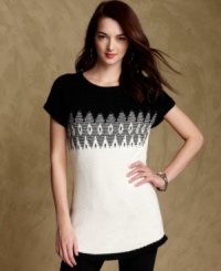 Get in the holiday spirit with Tommy Hilfiger's cute, cozy tunic sweater. it makes a perfect gift for loved ones or for yourself! Get in the holiday spirit with Tommy Hilfiger's cute, cozy tunic sweater. it makes a perfect gift for loved ones or for yourself!