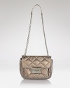 Richly crafted in quilted leather, this MICHAEL Michael Kors should flaunts effortless evening out allure. Slip it over the shoulder to add night-right polish.