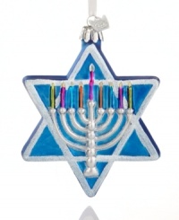 Have a happy and a merry with the Star of David ornament, featuring a silver menorah with colorful candles from Kurt Adler. Have a happy and a merry with the Star of David ornament, featuring a silver menorah with colorful candles from Kurt Adler.