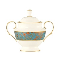 The luxurious, museum-quality floral motifs in Gilded Tapestry create a dramatic presentation sure to command attention at any dinner party. Warm ember hues and golden tones are offset by cool blue accents on this compelling pattern. Unique layering of of each place setting piece atop the other highlights the common threads of color and metallics while creating a sophisticated style. The luxurious, museum-quality floral motifs in Gilded Tapestry create a dramatic presentation sure to command attention at any dinner party. Warm ember hues and golden tones are offset by cool blue accents on this compelling pattern. Unique layering of of each place setting piece atop the other highlights the common threads of color and metallics while creating a sophisticated style.