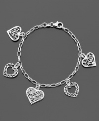 Embrace a charm bracelet full of heart. Features intricate heart-shaped charms. Crafted in sterling silver by Giani Bernini. Approximate length: 7-1/2 inches. Embrace a charm bracelet full of heart. Features intricate heart-shaped charms. Crafted in sterling silver by Giani Bernini. Approximate length: 7-1/2 inches.