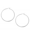 Don't mess with perfection. These traditional hoop earrings from Kenneth Cole New York are crafted in silver tone mixed metal with a click-top closure. Approximate diameter: 2 inches.