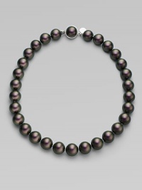A modern take on classic chic in a bold strand of iridescent Tahitian pearls. 12MM Tahitian pearls Sterling silver Length, about 16 Push-lock clasp Made in Spain 