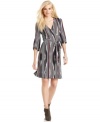Channel a cool '70's vibe in this graphic wrap dress from Calvin Klein Jeans.