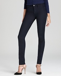 Slimming MARC BY MARC JACOBS jeans for a legging-style fit in a flattering dark wash for fall and beyond--a classic pump adds the perfect finishing touch. Slimming MARC BY MARC JACOBS jeans for a legging-style fit in a flattering dark wash for fall and beyond--a classic pump adds the perfect finishing touch.