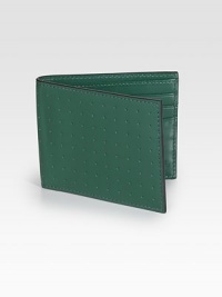 Inspired by leather detailing of vintage sports cars, monza leather is a combination of flat and perforated calf leather with a matte finish. Debossed logo detail Six card slots Two pocket sleeves 4W X 3½H Imported 