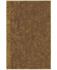 Add rich, shimmering gold texture to any modern room with the Metallic area rug from Dalyn. Hand-tufted of soft polyester, this high-luster shag area rug puts comfort and fun back in floor decor. Add rich, shimmering gold texture to any modern room with the Metallic area rug from Dalyn. Hand-tufted of soft polyester, this high-luster shag area rug puts comfort and fun back in floor decor.