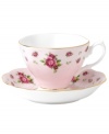 Revive a classic dinnerware pattern with the Vintage cup and saucer. Lush blossoms plucked from Royal Doulton's Old Country Roses collection flower on pink bone china with ruffled gold edges.
