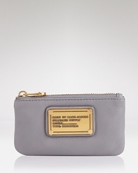 Key in and covet this MARC BY MARC JACOBS pouch, coolly crafted of leather with simply styled detailing.