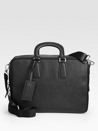 Protect your investment with this stylish computer case rendered in textured saffiano leather.Zip closureDouble top handlesAdjustable shoulder strapInterior pockets15¾W x 12H x 11DMade in Italy