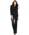 Ruffles add a whimsical touch to the streamlined silhouette of Tahari by ASL's petite pantsuit.