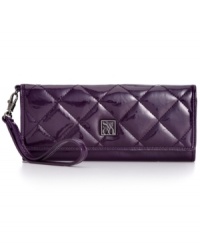 Let your style shine through with this faux patent leather wristlet from Style&co. Featuring a cool quilted pattern and plenty of pockets and compartments, it's ideally sized to slip inside almost any handbag. Let your style shine through with this faux patent leather wristlet from Style&co. Featuring a cool quilted pattern and plenty of pockets and compartments, it's ideally sized to slip inside almost any handbag.