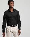 An ultraclean look. Cotton button-front shirt has spread collar, no pockets and a slightly lean fit.