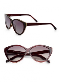 These retro-inspired resin frames are embellished in contrasting metal. Available in translucent burgundy with smoke gradient lens. 100% UV protectionImported