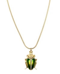 A classic symbol of good luck, RACHEL Rachel Roy's shimmering green beetle pendant will become a fave in your accessory collection. Crafted in gold-plated mixed metal with sparkling glass accents. Approximate length: 32 inches. Approximate drop: 1-1/2 inches. A classic symbol of good luck, RACHEL Rachel Roy's shimmering green beetle pendant will become a fave in your accessory collection. Crafted in gold-plated mixed metal with sparkling glass accents. Approximate length: 32 inches. Approximate drop: 1-1/2 inches.